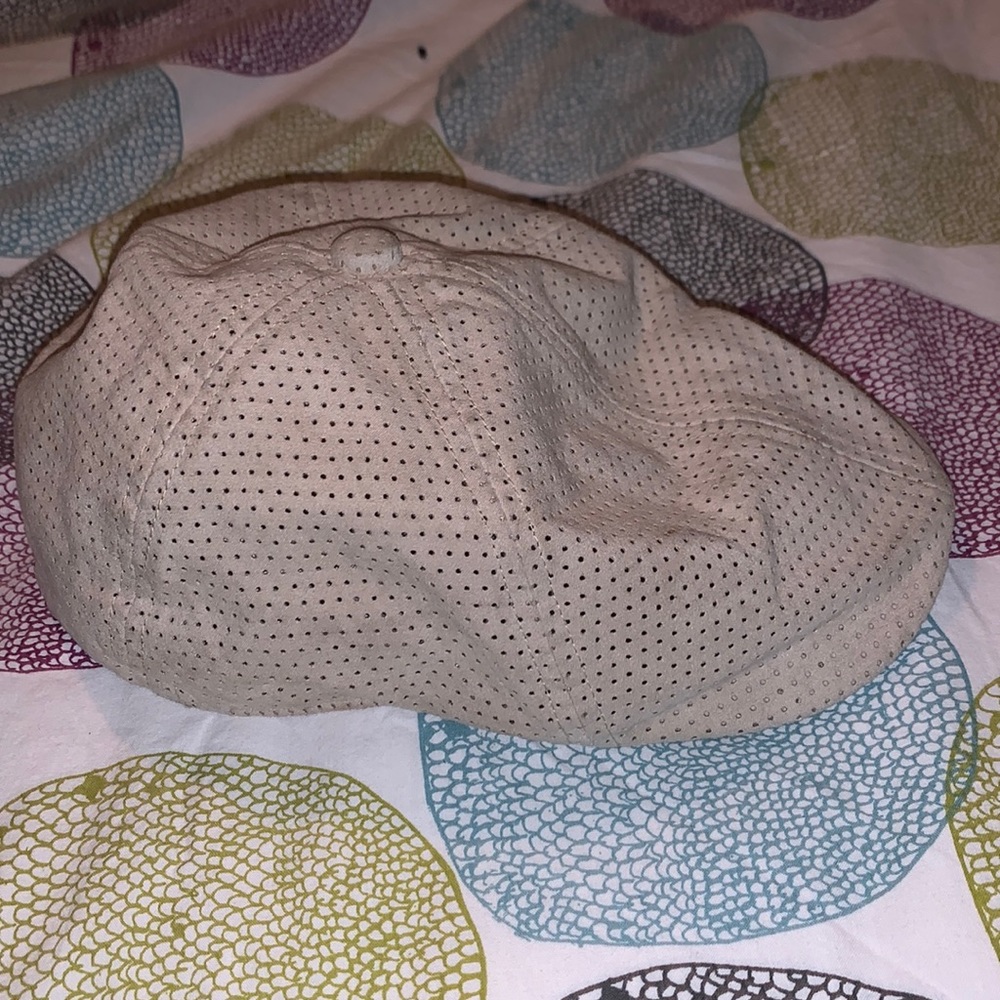 Mens gold half. Beige, small/medium. Barely used. Fits my head, 7 1/4